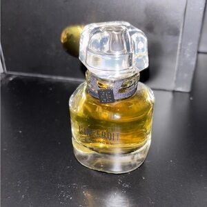 Givenchy L'Interdit Fragrance with Golden Hue